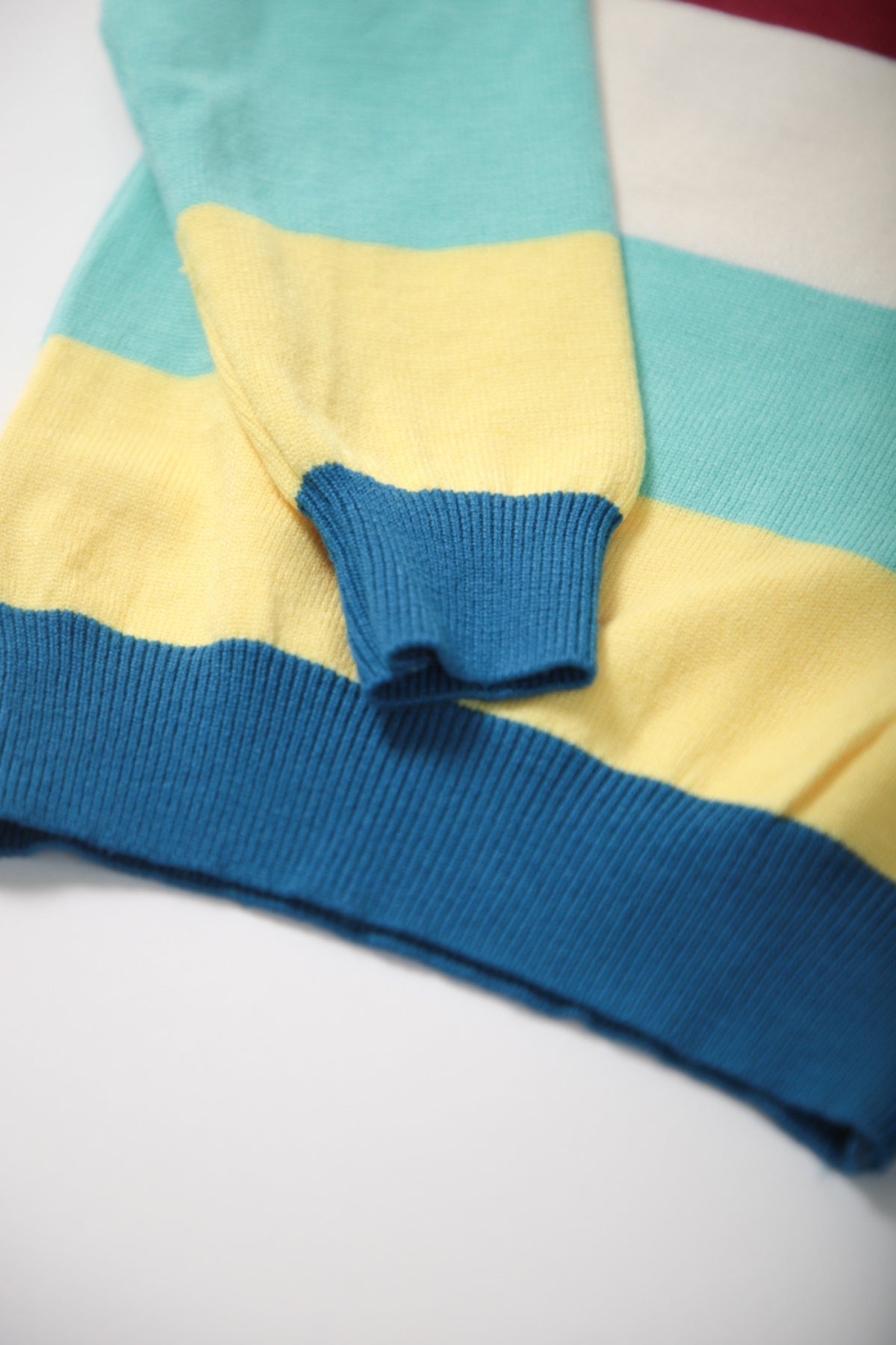 Collection of Clorful jumper for boys with animal painted blue in a gallery layout