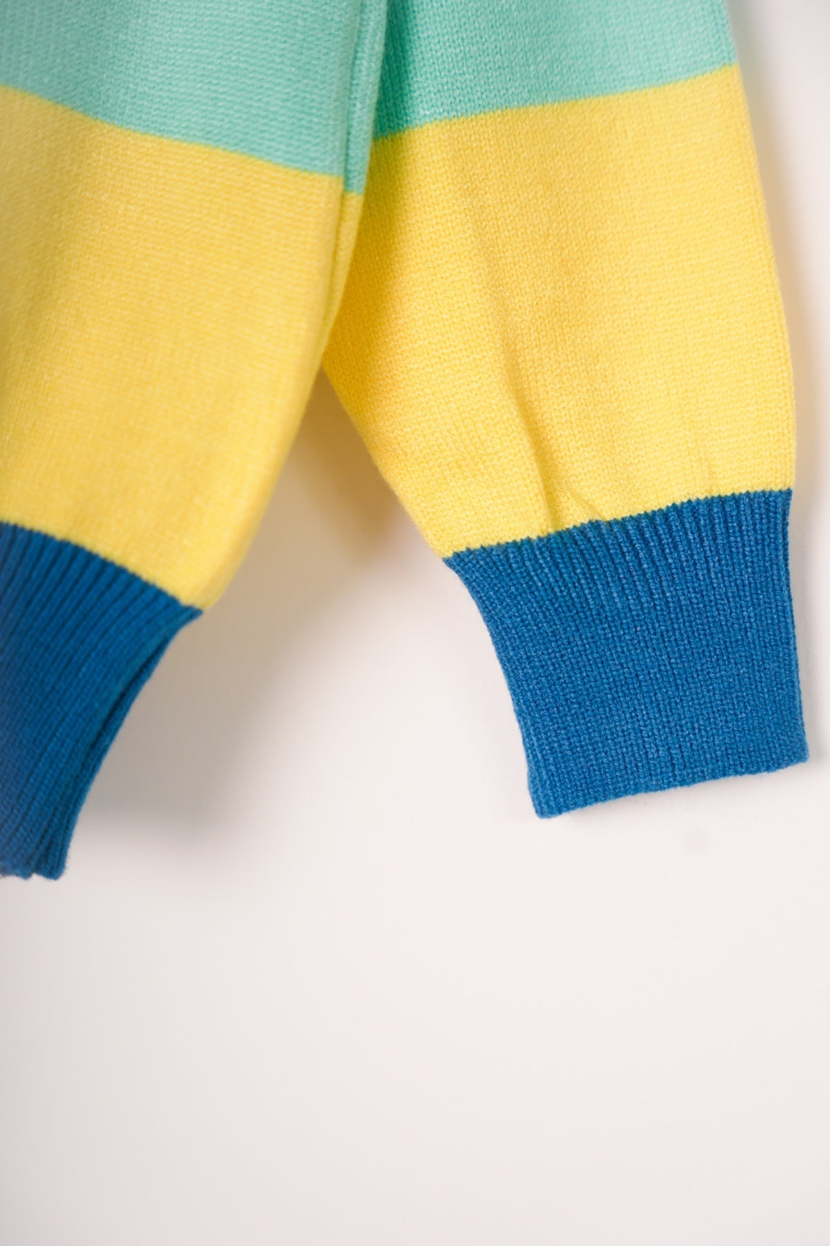 Collection of Clorful jumper for boys with animal painted blue in a gallery layout